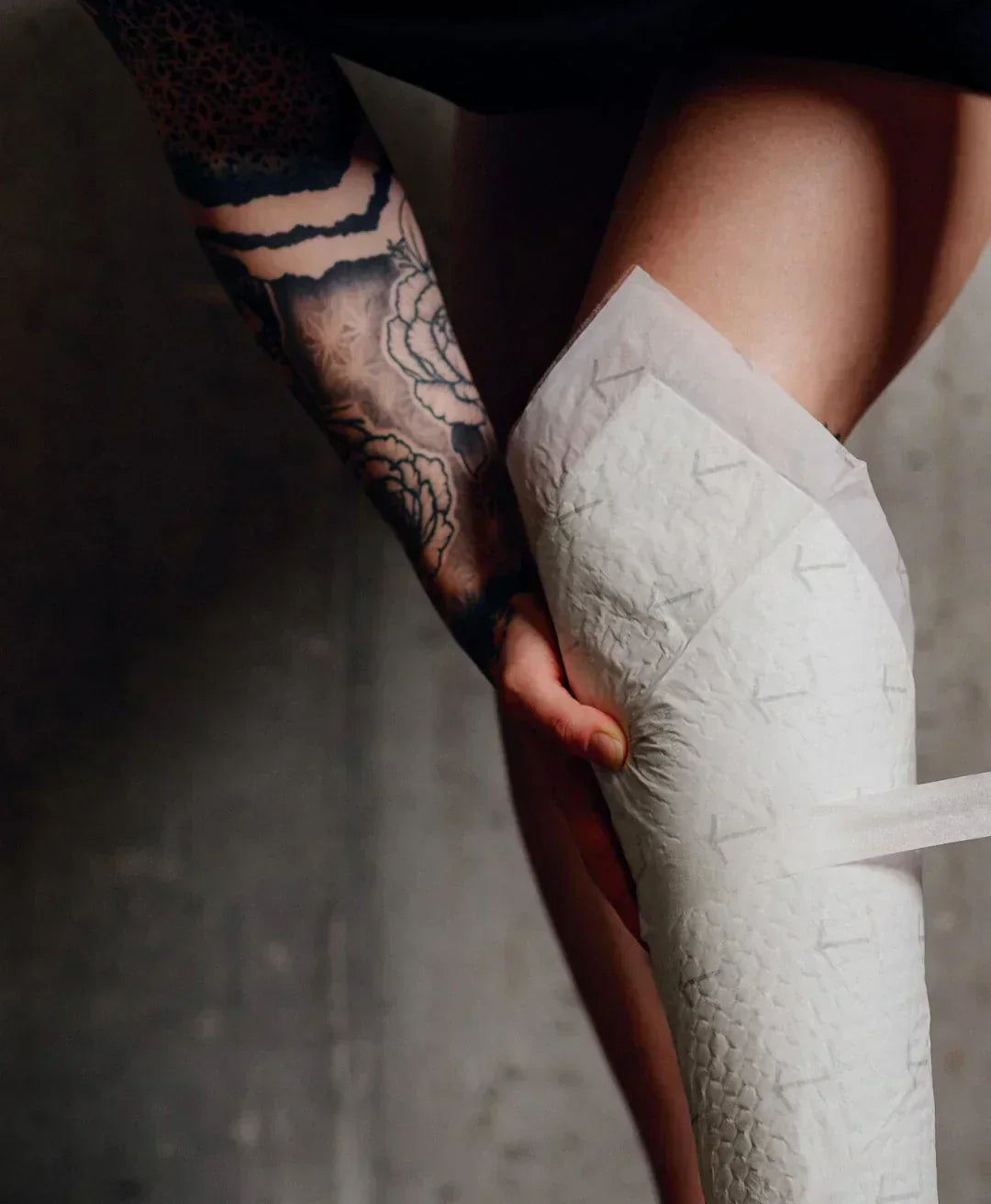 Second skin e pensos usados na cicatrização de tatuagem