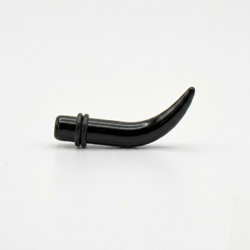 Black horn-shaped object on a white background